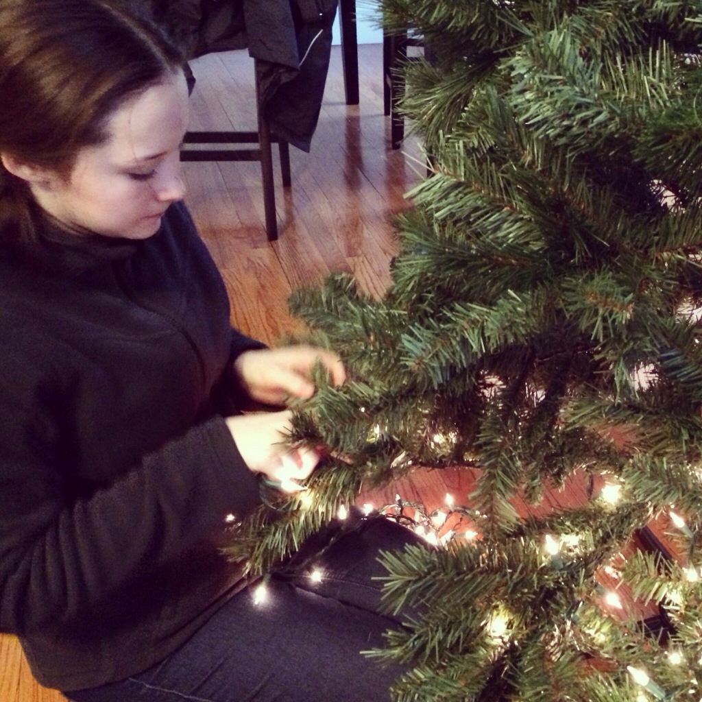 stringing Christmas lights